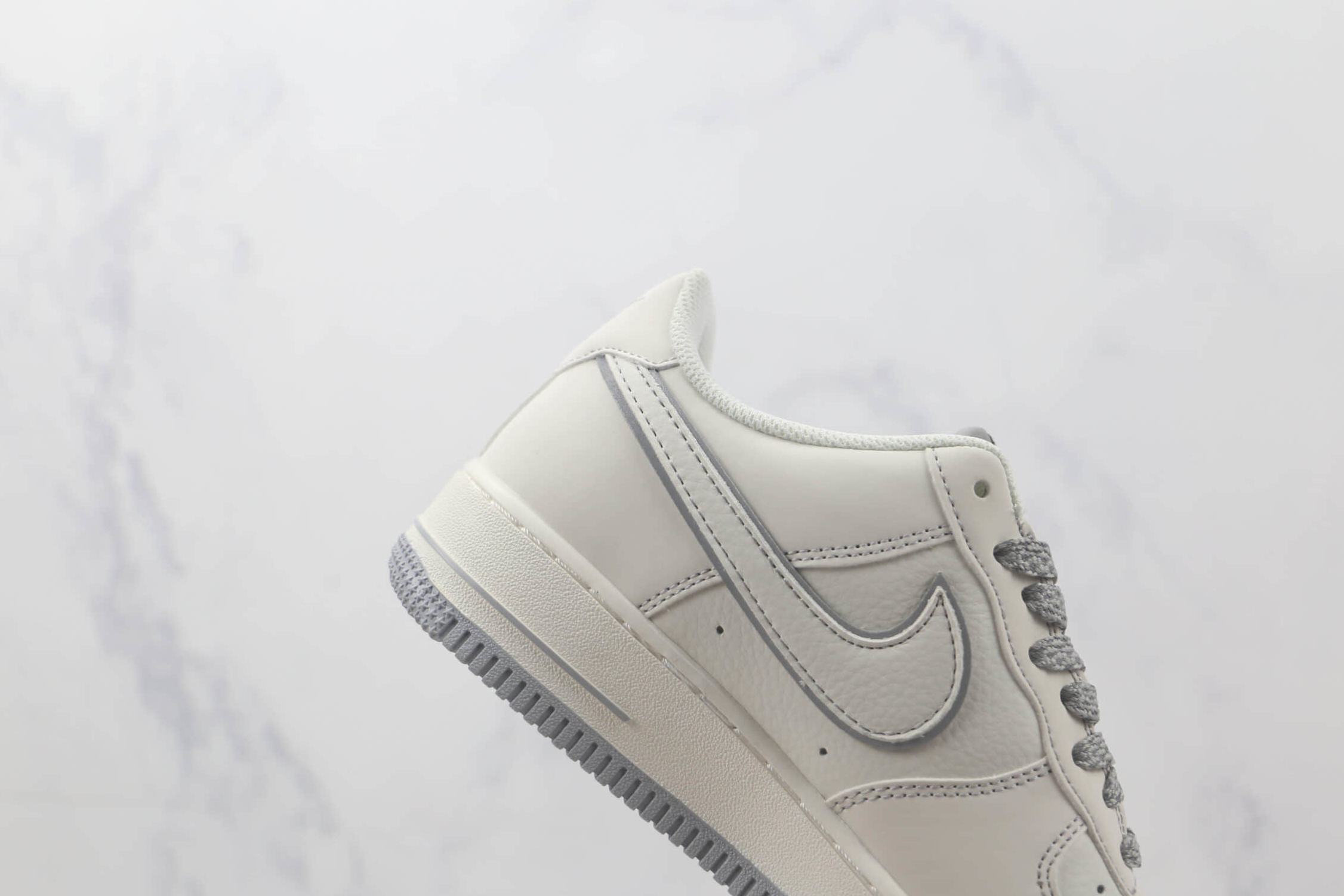 Undefeated x Nike Air Force 1 07 Low Cream Light Grey - UN3699-055, Limited Edition & Sleek.