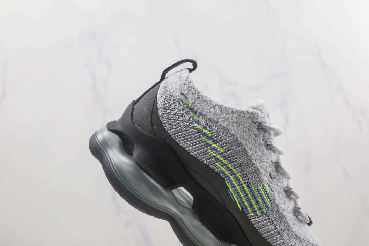 Nike Air Max Scorpion Flyknit 'Wolf Grey Volt' DJ4701-002 - Shop now for the latest Nike sneakers!